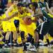 Michigan freshman Trey Burke guards Ohio University junior D.J. Cooper in the first half of the second round of the NCAA tournament at Bridgestone Arena in Nashville, Tenn.  Melanie Maxwell I AnnArbor.com